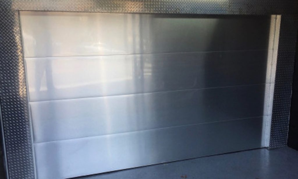 metal garage door with window film