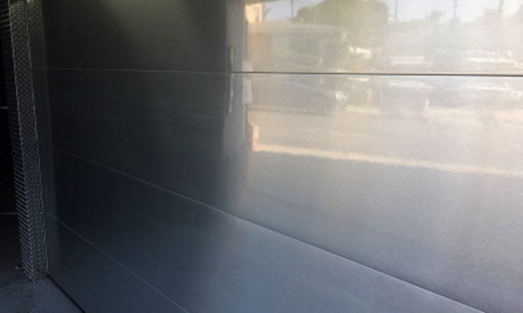 metal garage door with window film